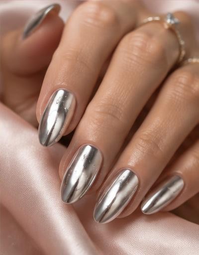 Celestial Chrome manicure inspiration on a real hand
