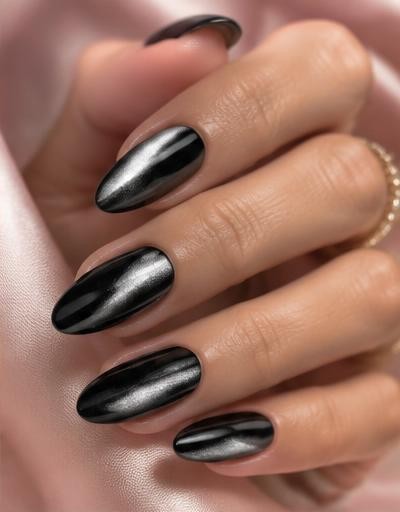Midnight Cat Eye manicure inspiration on a real hand